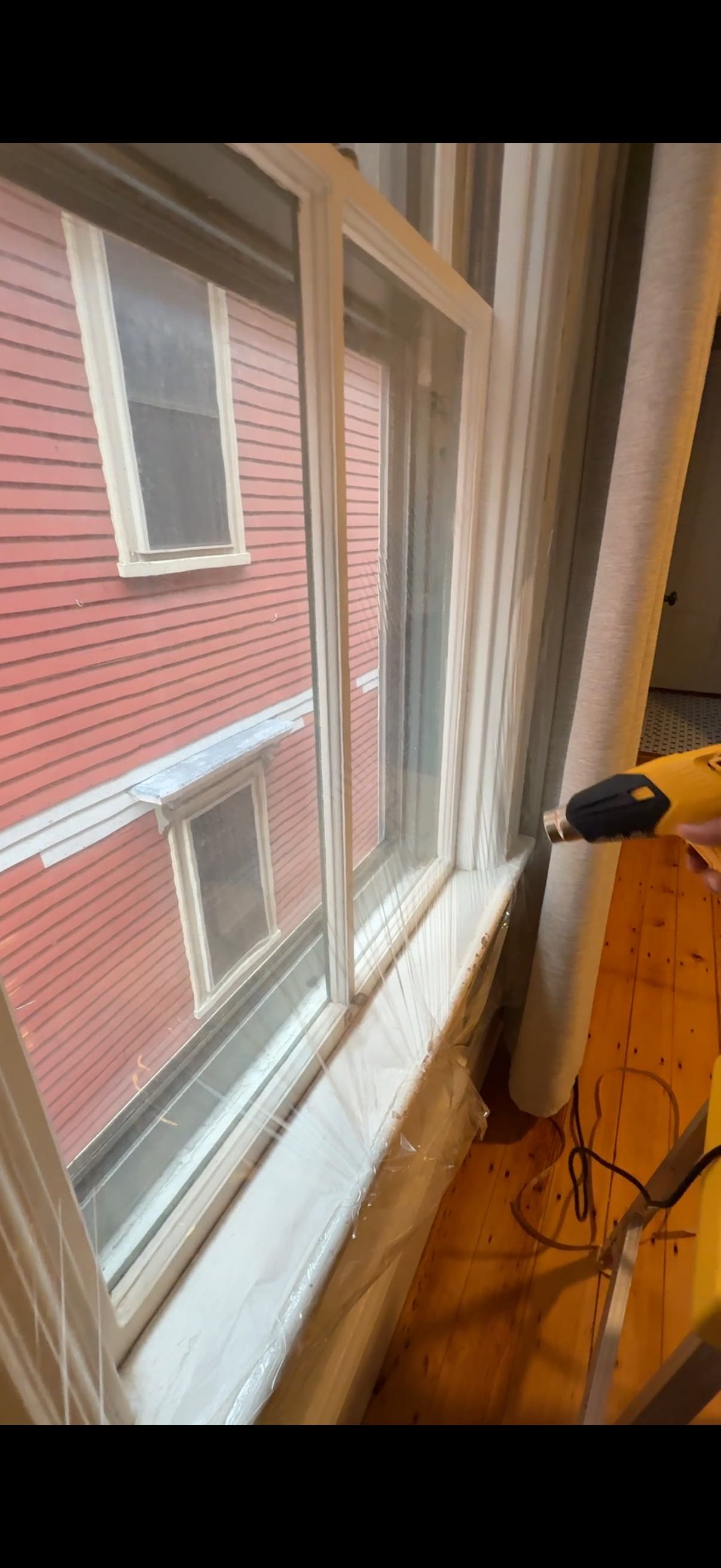 Installing clear film on window interior